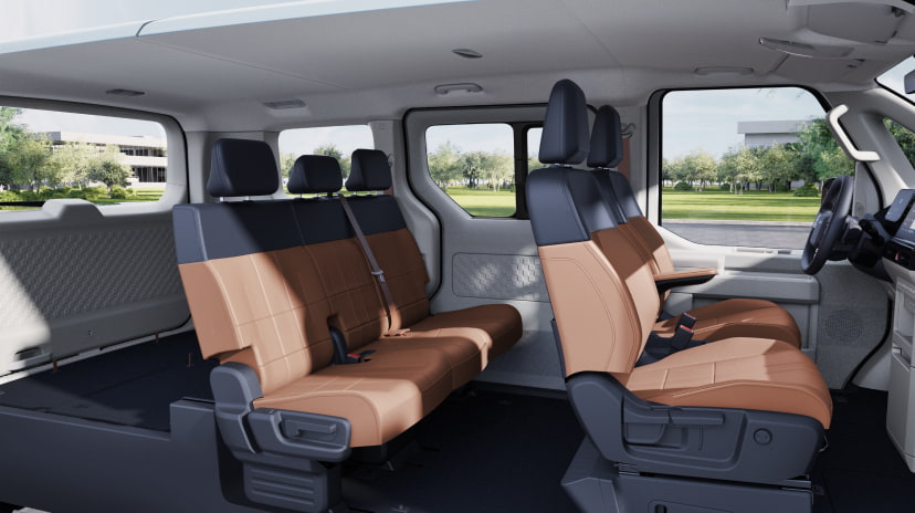 Seitliche Innenansicht des Kia PV5 Passenger mit flexibler Sitzanordnung im Fond, 2 Sitzreihen
